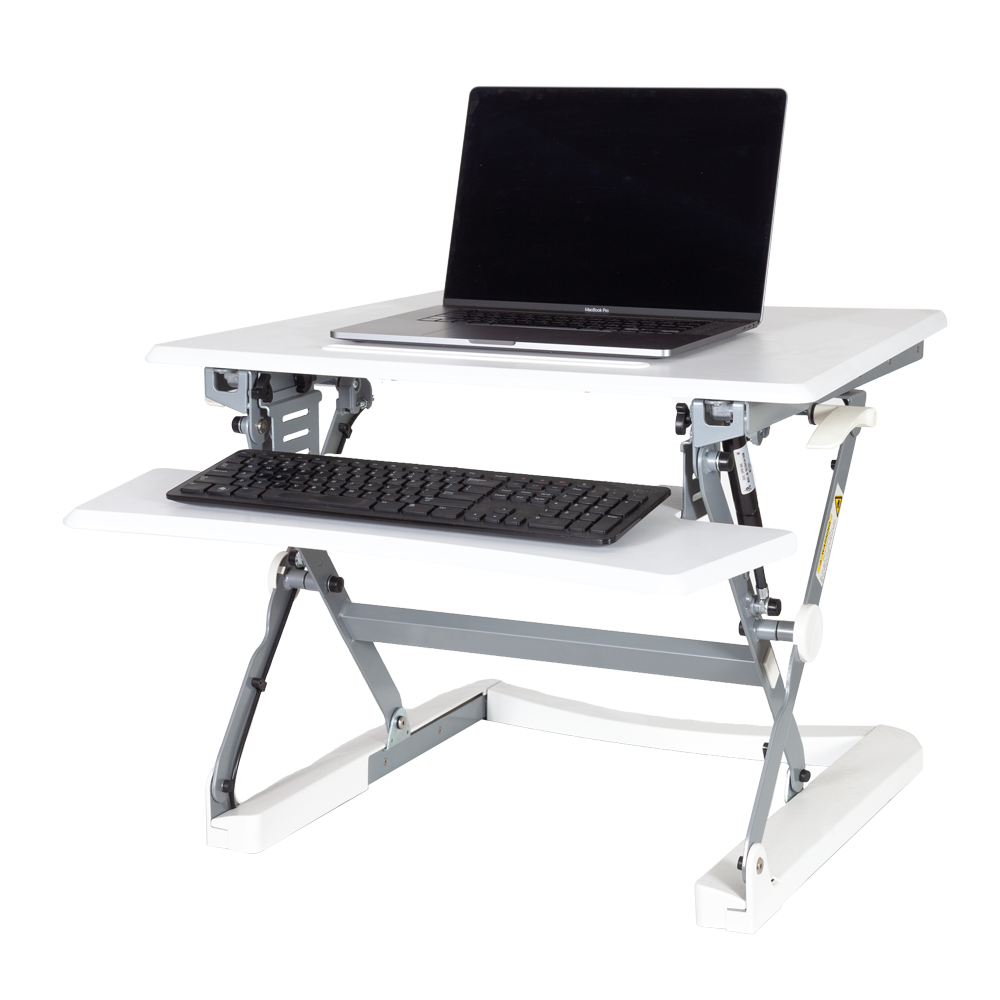 PLUS 35" sit stand workstation fully extended with a laptop on the surface. 